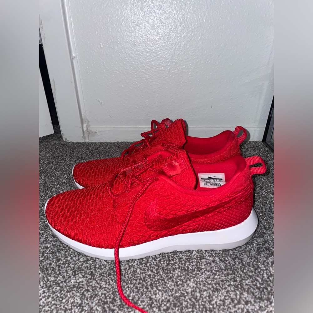 Red Nike running shoes